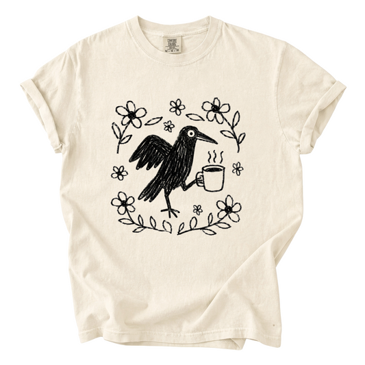 Cute Crow Holding Coffee Comfort Colors T-Shirt | Whimsical Hand-Drawn Bird Graphic Tee